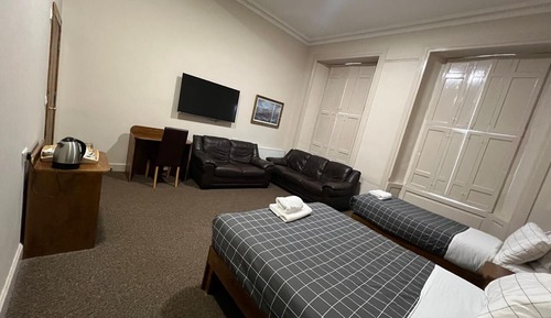 Habitación triple Deluxe