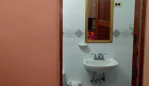 Habitación, varias camas