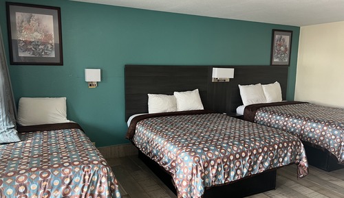Habitación triple Deluxe, varias camas, no fumadores