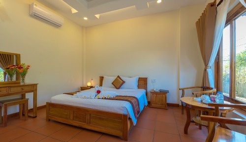 Bungalow Deluxe, 1 cama de matrimonio grande, vistas al jardín