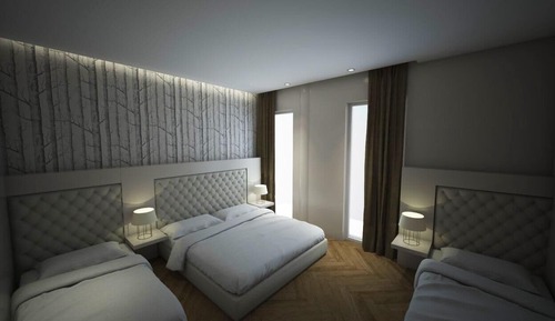 Habitación cuádruple, balcón, vistas parciales al mar