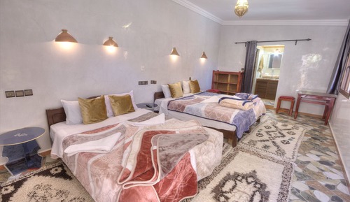 Habitación cuádruple, varias camas
