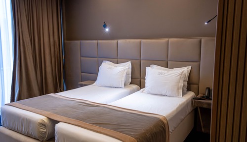 Habitación superior con 1 cama doble o 2 individuales