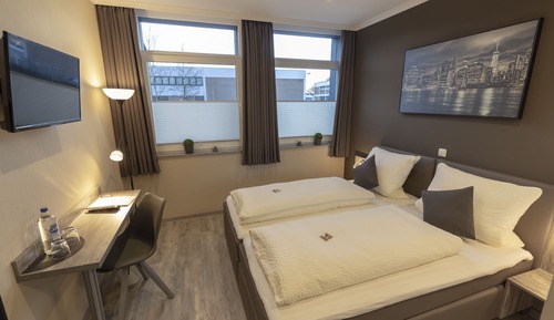 Habitación estándar con 1 cama doble o 2 individuales