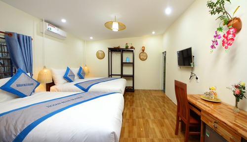 Habitación triple superior, vistas al jardín