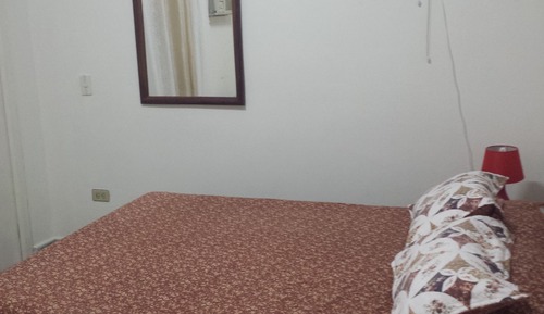 Habitación triple básica, varias camas