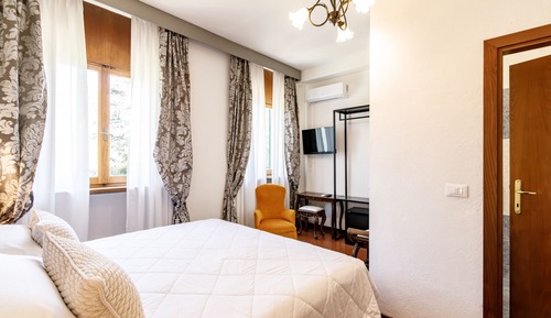 Habitación clásica, 1 cama de matrimonio, Aire acondicionado, vistas al jardín