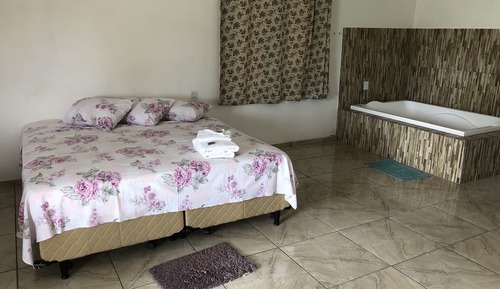 Chalet Deluxe, 1 cama de matrimonio, bañera de hidromasaje, vistas al patio