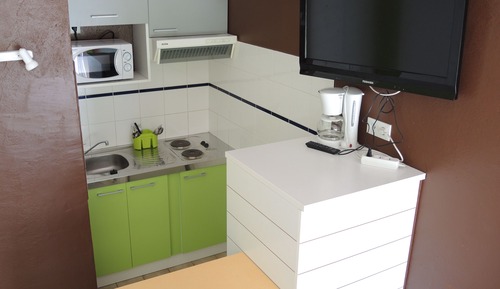 Estudio, varias camas