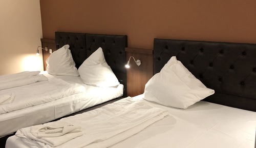 Habitación, varias camas