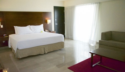 Suite, 1 cama de matrimonio grande con sofá cama, balcón, vistas parciales al mar (Balcony)