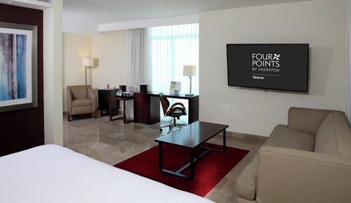 Suite junior, 1 cama de matrimonio grande con sofá cama, balcón, vistas a la ciudad (Balcony)