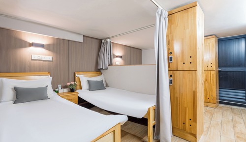 Dormitorio compartido económico, sin ventanas