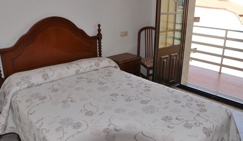 Habitación estándar con 1 cama doble o 2 individuales