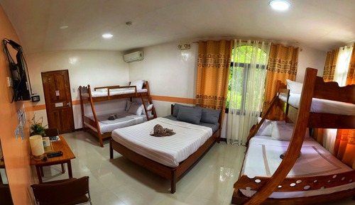 Habitación familiar, varias camas