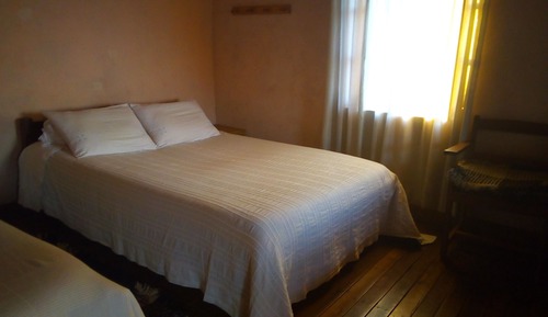Habitación triple básica, varias camas