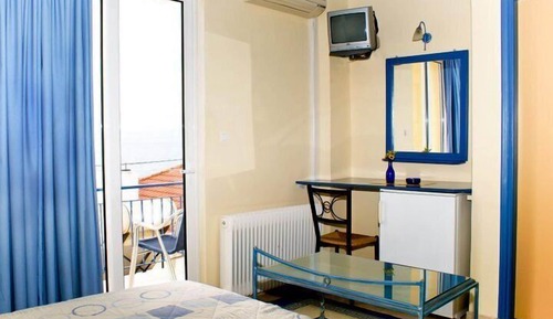 Habitación triple, vistas al mar