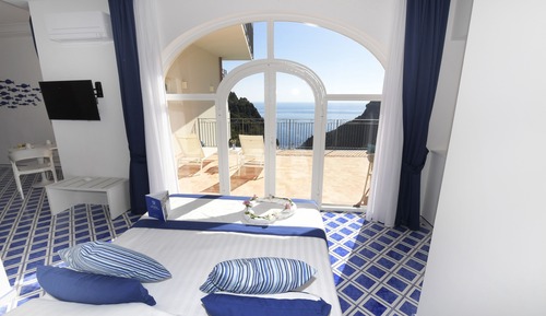 Habitación Deluxe doble, 1 cama de matrimonio con sofá cama, vistas al mar