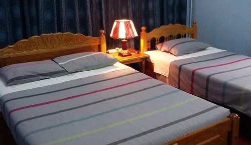 Habitación triple Deluxe
