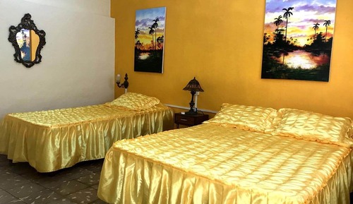 Habitación triple Confort, vistas al jardín