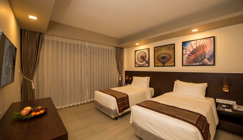 Habitación Deluxe con 2 camas individuales, vistas parciales al mar