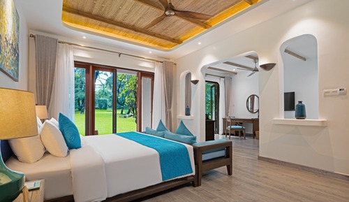 Suite, 1 cama de matrimonio grande, vistas al jardín