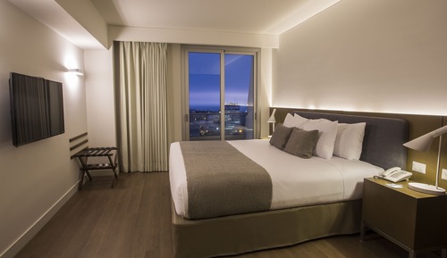 Suite, 1 cama de matrimonio grande, vistas a la ciudad
