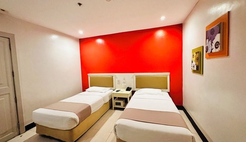 Habitación básica con 2 camas individuales