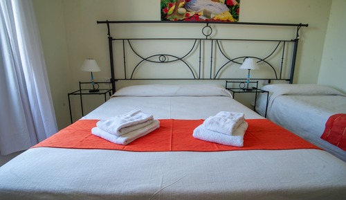 Habitación cuádruple clásica, varias camas, no fumadores, vistas al jardín