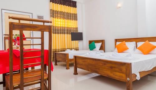 Habitación triple Deluxe, varias camas, no fumadores