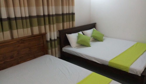 Habitación familiar, fumadores, vistas al jardín