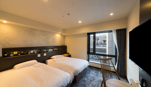 Habitación superior con 2 camas individuales, no fumadores (Single Use - Room Only)