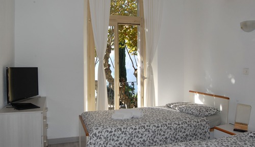 Habitación con 2 camas individuales, vistas al lago