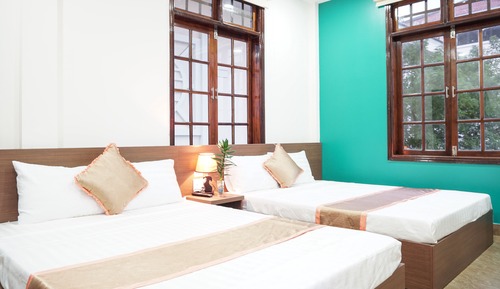 Habitación cuádruple Deluxe, 2 camas dobles