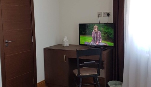 Habitación triple Deluxe, varias camas