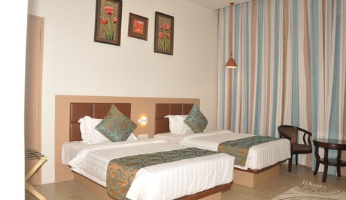 Habitación Deluxe con 1 cama doble o 2 individuales