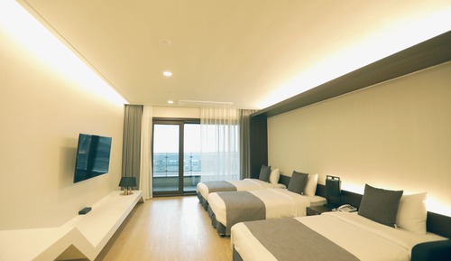 Habitación triple Deluxe