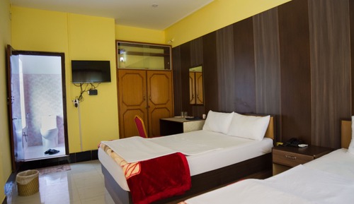 Habitación Deluxe, 2 camas de matrimonio, vistas al jardín