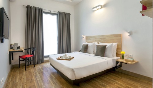 Habitación Deluxe con 2 camas individuales, 1 cama doble, vistas a la ciudad