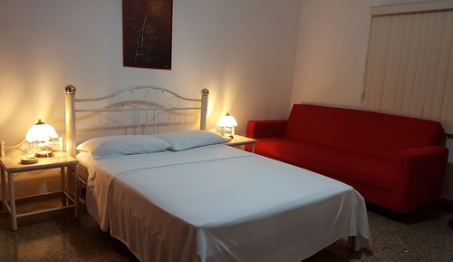 Habitación triple clásica, vistas al jardín
