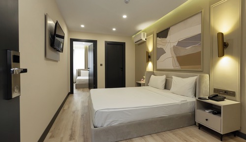 Habitación triple Deluxe