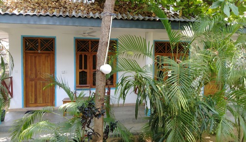Habitación triple Deluxe, vistas al jardín