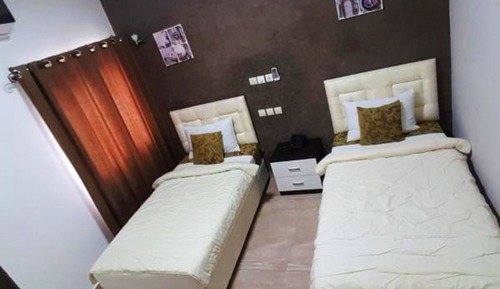 Habitación con 2 camas individuales