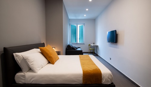 Habitación cuádruple Deluxe, vistas a la ciudad