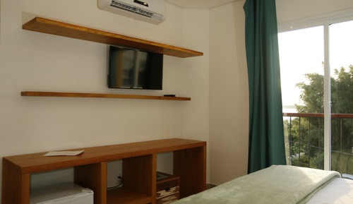 Suite superior, varias camas, vistas parciales al mar