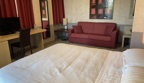 Habitación cuádruple Deluxe, 1 cama doble con sofá cama