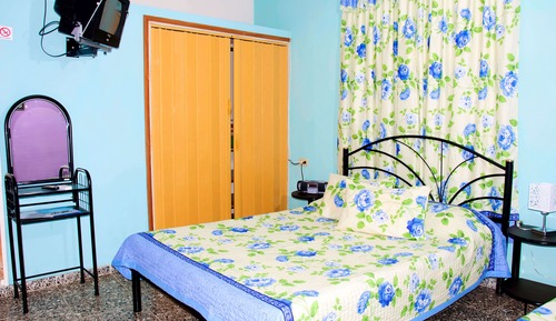 Habitación triple Confort, varias camas, vistas al jardín