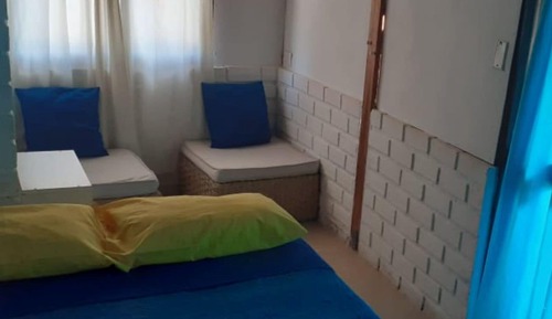 Habitación cuádruple familiar, 2 camas de matrimonio, vistas a la piscina