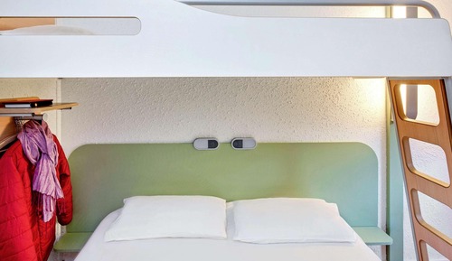 Habitación triple, varias camas