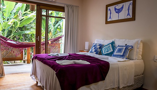Habitación cuádruple familiar, varias camas, vistas al jardín